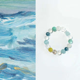 AURA LITH Clarity & Courage Aquamarine and Clear Quartz Bracelet, a natural gemstone bracelet designed to quiet mental chatter and deepen serene energy.