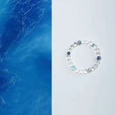 AURA LITH Clarity & Peace Clear Quartz and Aquamarine Bracelet, a natural gemstone bracelet designed to clear mental clutter.