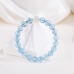 Close-up look of genuine 7A grade aquamarine crystals and spiritual gemstone jewelry by AURA LITH.