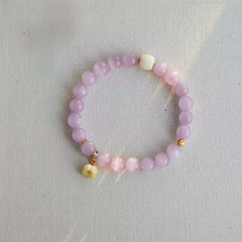 Premium kunzite crystal beaded bracelet variant from AURA LITH, perfect as a personalized mindfulness crystal gift for women.