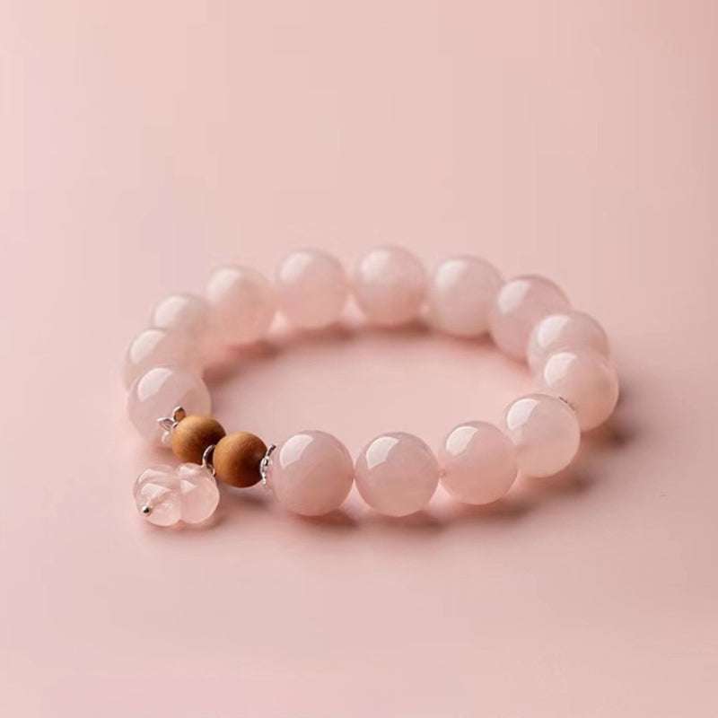 AURA LITH Libra Alignment Rose Quartz Zodiac Bracelet, a natural gemstone bracelet featuring premium Madagascar crystal for emotional balance.