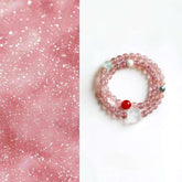 AURA LITH Love & Abundance Strawberry Quartz Crystal Bracelet, a natural gemstone bracelet designed to open your heart chakra and deepen positive energy.