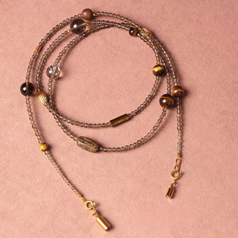 Handmade crystal jewelry featuring premium tiger's eye beads to support emotional balance, clarity, and prosperity.