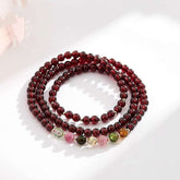 AURA LITH Root Grounding Garnet Chakra Bracelet, a natural gemstone bracelet for root alignment and cosmic protection.
