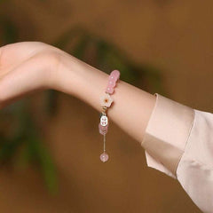 AURA LITH pink crystal bracelet designed for Taurus zodiac alignment, supporting heart-centered stability and grounding.