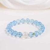 AURA LITH Throat Balance Aquamarine Chakra Bracelet, a natural gemstone bracelet for clear communication and truth.
