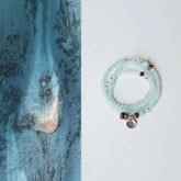 AURA LITH Tranquility & Awakening Aquamarine and Agarwood Wrap Bracelet, a natural gemstone bracelet designed to quiet the mind and deepen alignment.