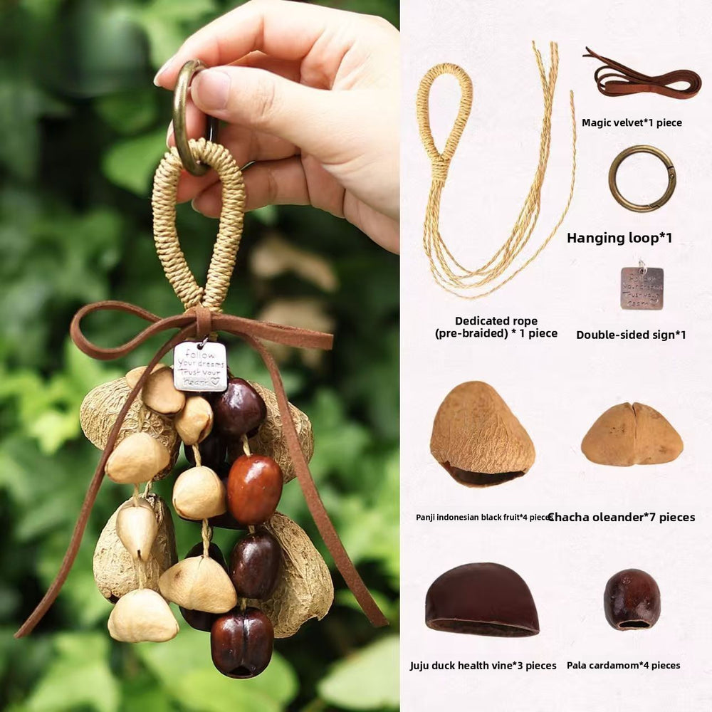 DIY kit components for natural fruit shell wind chime, featuring a finished hanging charm on the left and a detailed display of materials including seed pods, braided rope, metal hanging loops, and decorative signs on the right.