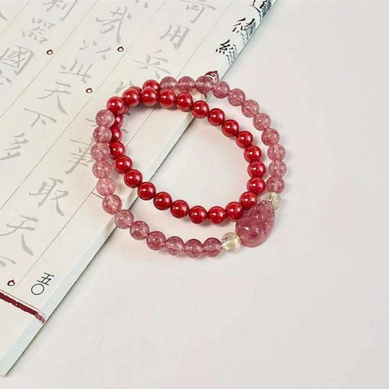 Close-up look of high-vibration rutilated quartz stones and spiritual gemstone jewelry by AURA LITH.
