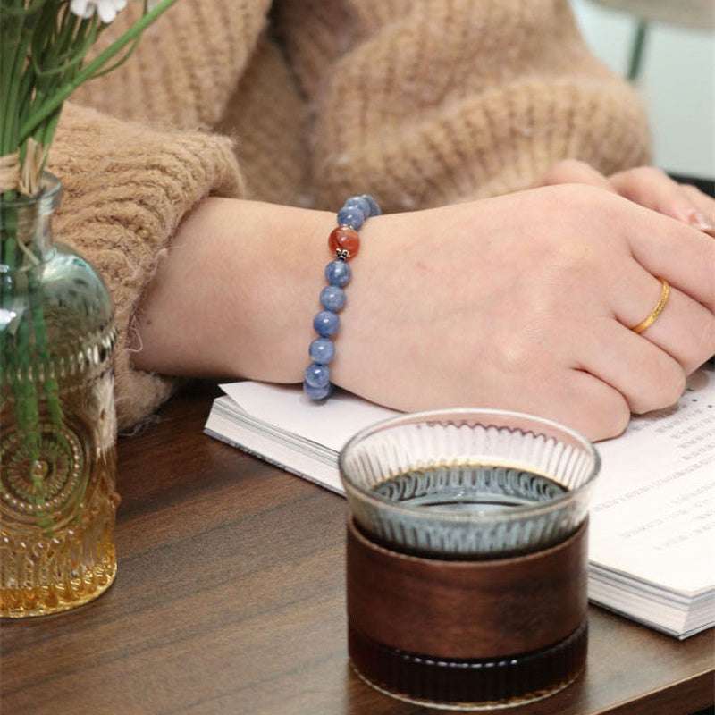 Blue kyanite bracelet designed for Cancer zodiac alignment and cosmic protection by AURA LITH.
