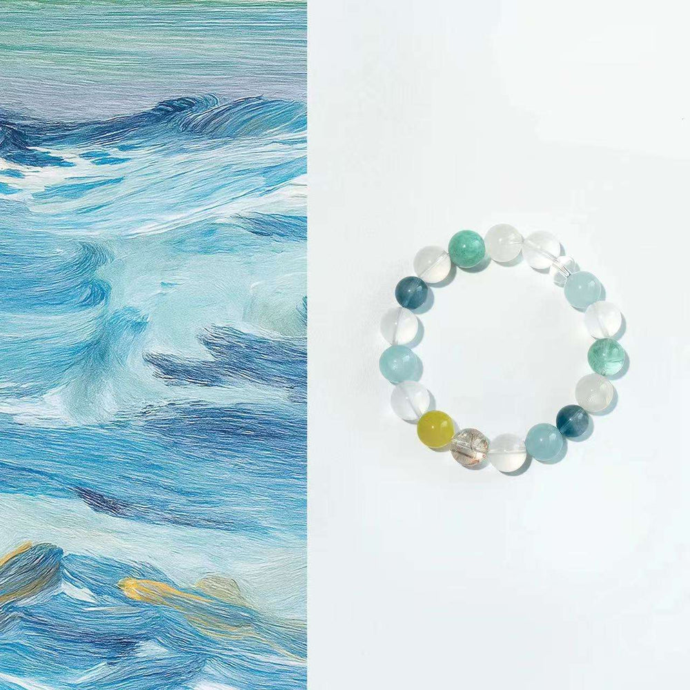 AURA LITH Clarity & Courage Aquamarine and Clear Quartz Bracelet, a natural gemstone bracelet designed to quiet mental chatter and deepen serene energy.