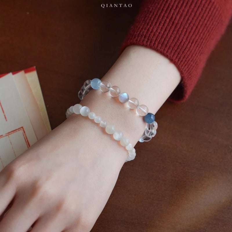 Close-up look of genuine 7A grade clear quartz stones and radiant protective crystals from AURA LITH cosmic jewelry.