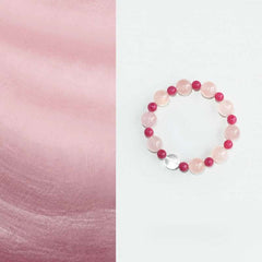 AURA LITH Divine Love Rose Quartz and Rhodonite Crystal Bracelet, a natural gemstone bracelet designed to open your heart chakra and deepen compassionate energy.