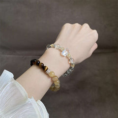 Close-up look of genuine 7A grade clear quartz stones and spiritual gemstone jewelry by AURA LITH.
