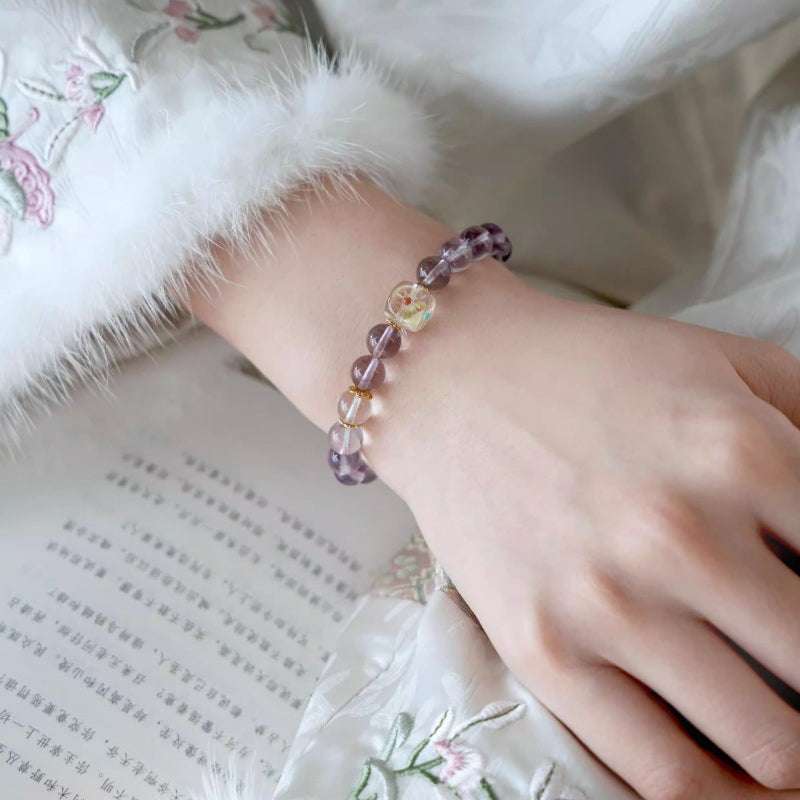 Spiritual crystal chakra bracelet for purifying personal energy and boosting positive transformation, handmade by AURA LITH.