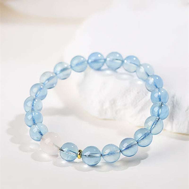 Spiritual crystal chakra bracelet for throat chakra balancing, perfect as a personalized mindfulness gift.