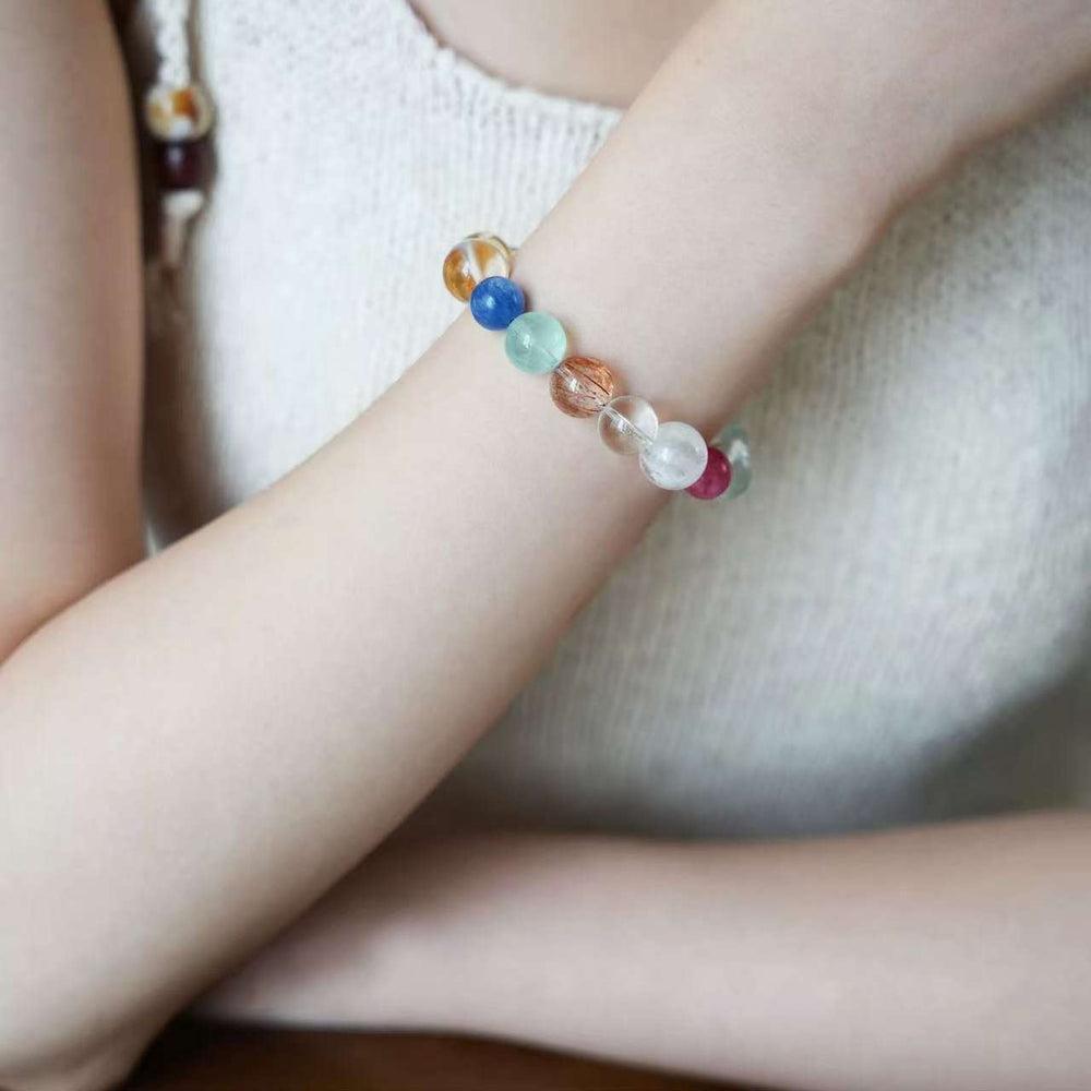 Premium multi-stone and agarwood protective bracelet from AURA LITH, perfect as a personalized mindfulness crystal gift.