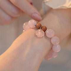 AURA LITH rose quartz crystal bracelet designed for Libra zodiac alignment, supporting heart chakra activation and peace.