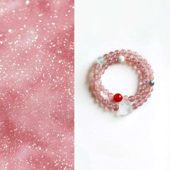 AURA LITH Love & Abundance Strawberry Quartz Crystal Bracelet, a natural gemstone bracelet designed to open your heart chakra and deepen positive energy.
