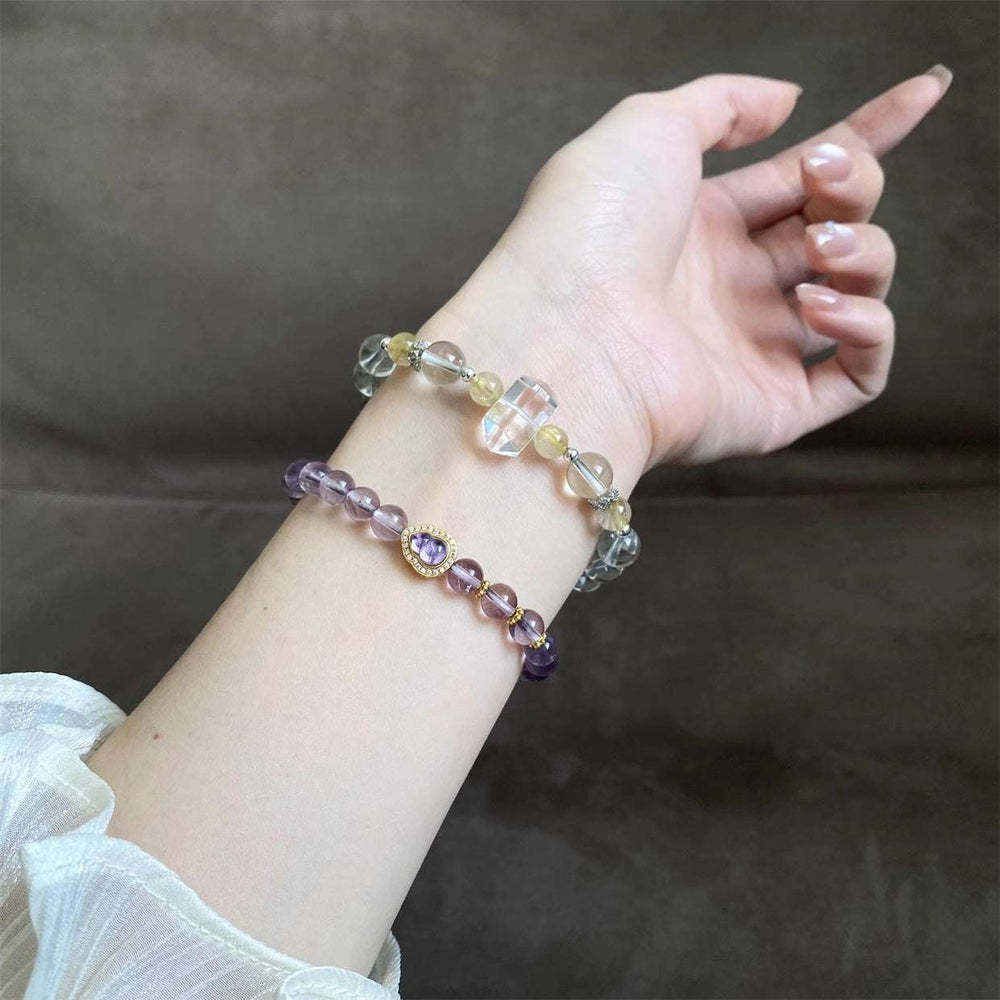 AURA LITH clear quartz crystal bracelet designed for crown chakra alignment and connecting to higher consciousness.