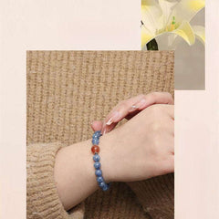 Handmade crystal jewelry featuring genuine blue kyanite beads for stress relief and emotional support.
