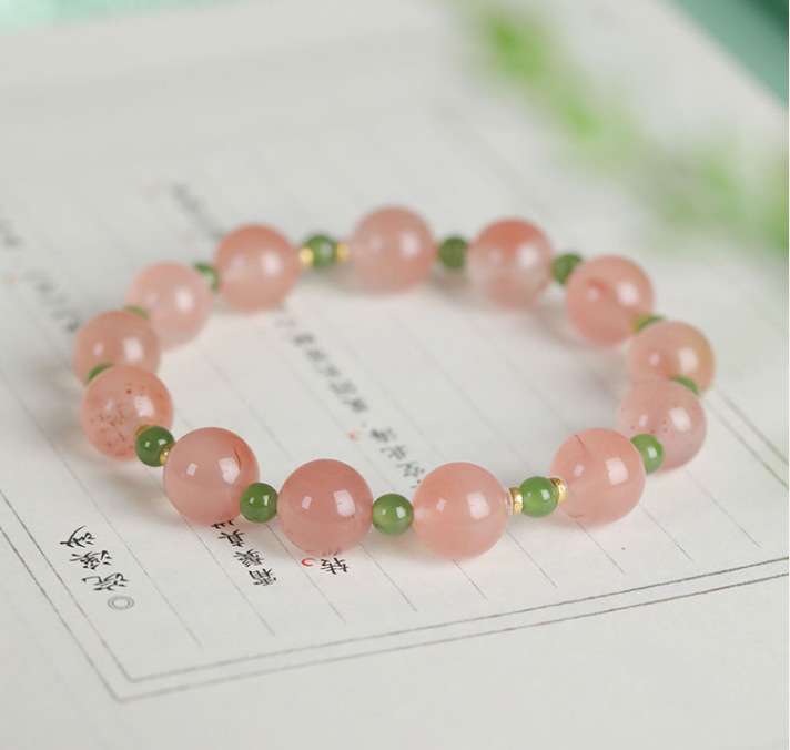 Handmade crystal jewelry featuring premium ice southern red agate and jade to support emotional healing and inner peace.