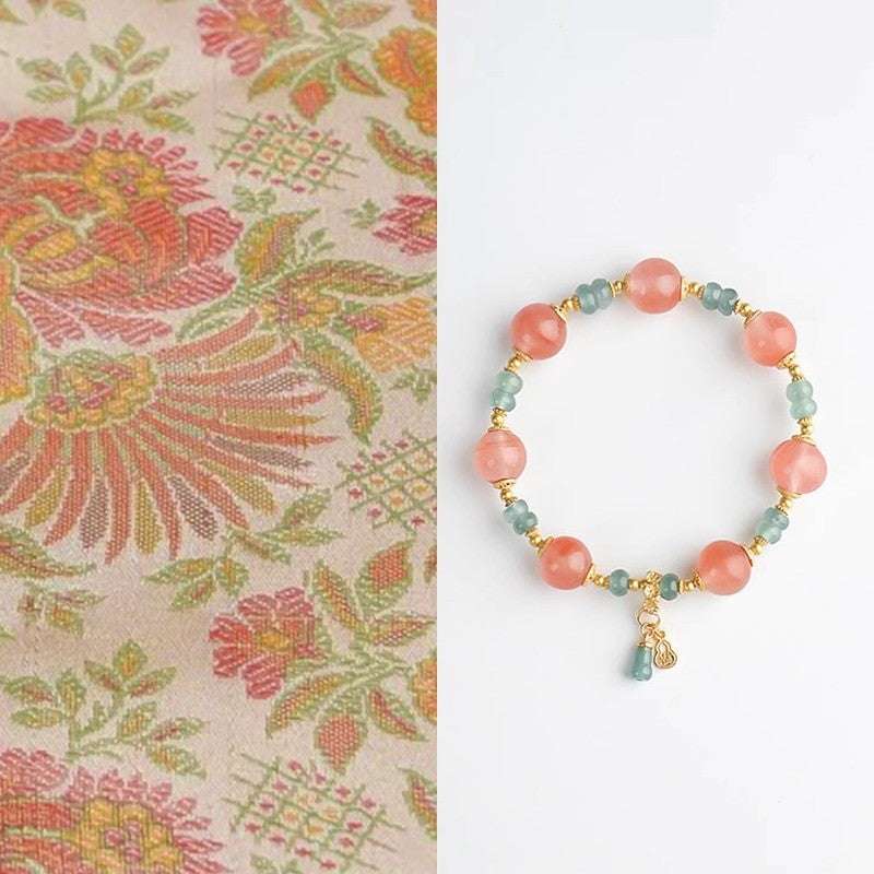 Premium ice southern red agate beaded bracelet from AURA LITH, boosting positive transformation and vitality.