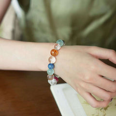 AURA LITH Rose Island Crystal Bracelet variant worn on a wrist for deep aura shielding and inner harmony.