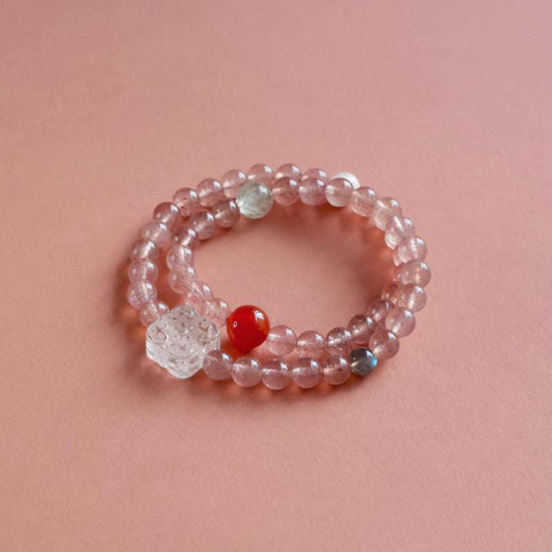 Informative crystal healing poster displaying the spiritual properties of premium strawberry quartz by AURA LITH.