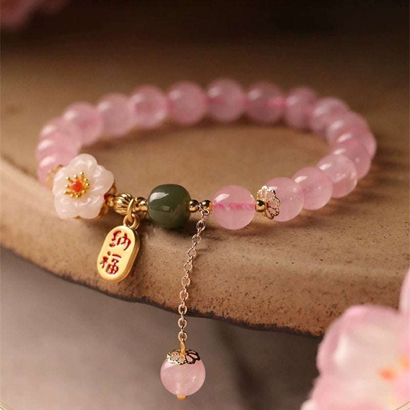 AURA LITH Taurus Abundance Rose Quartz and Jade Zodiac Bracelet, a natural gemstone bracelet for prosperity and emotional comfort.