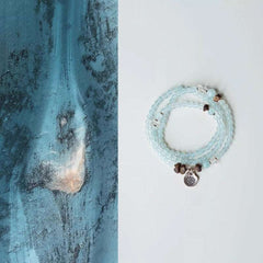 AURA LITH Tranquility & Awakening Aquamarine and Agarwood Wrap Bracelet, a natural gemstone bracelet designed to quiet the mind and deepen alignment.