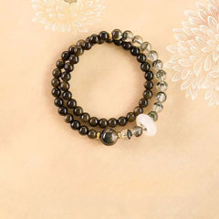 Handmade crystal jewelry featuring a premium green phantom quartz zodiac bracelet worn to bring mental order.