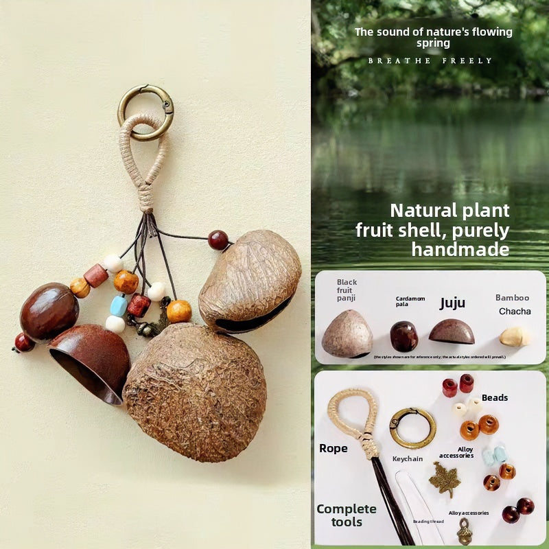 Product info graphic for the Natural Fruit Shell Wind Chime & Shaker DIY Kit, showcasing a finished handmade charm and a detailed breakdown of raw materials including seed pods, wooden beads, rope, and tools.